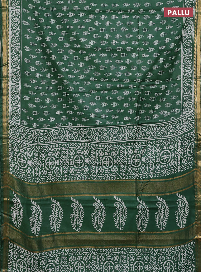 Semi bhagalpuri saree bottle green with allover prints and zari woven border