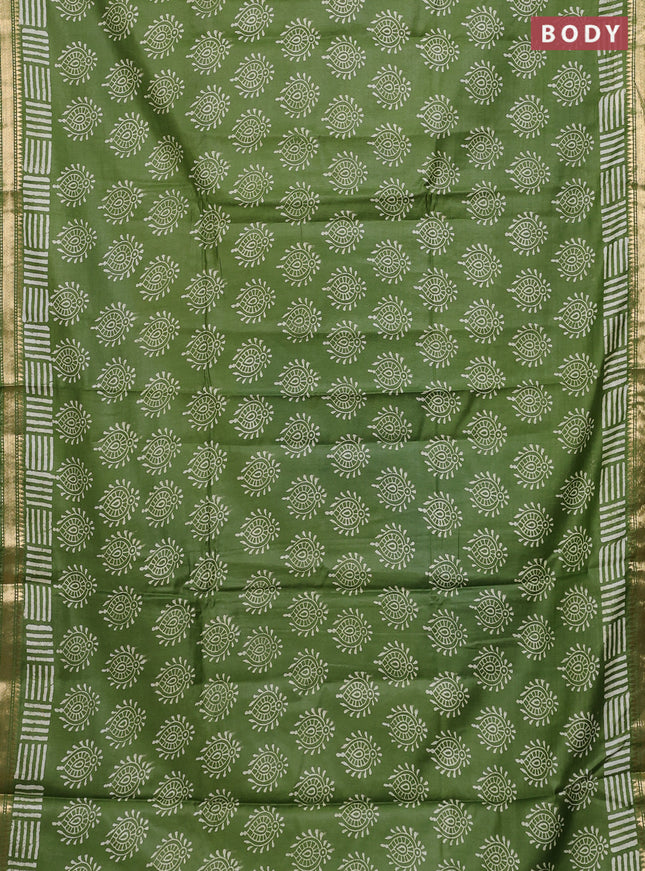 Semi bhagalpuri saree light green with allover prints and zari woven border
