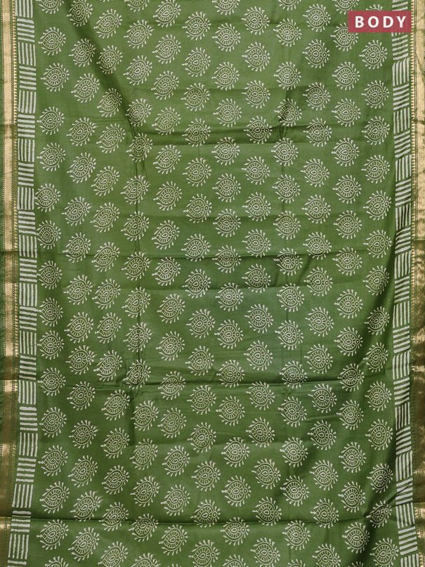 Semi bhagalpuri saree light green with allover prints and zari woven border