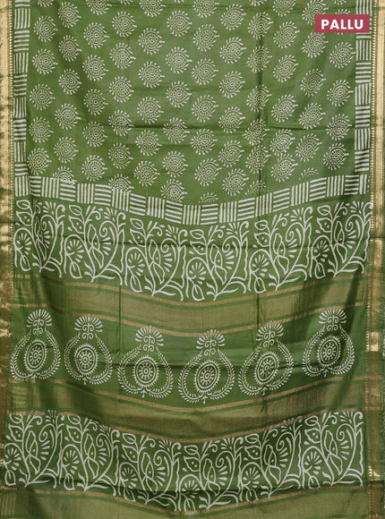 Semi bhagalpuri saree light green with allover prints and zari woven border
