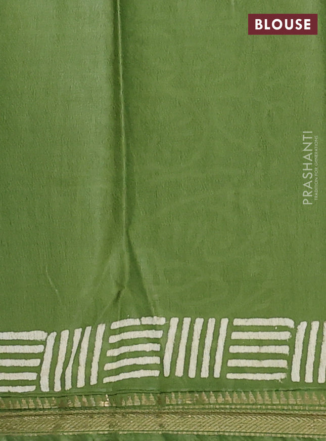 Semi bhagalpuri saree light green with allover prints and zari woven border