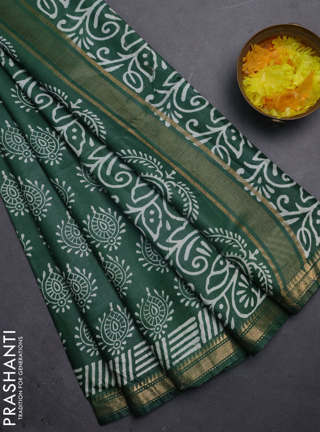 Semi bhagalpuri saree bottle green with allover prints and zari woven border