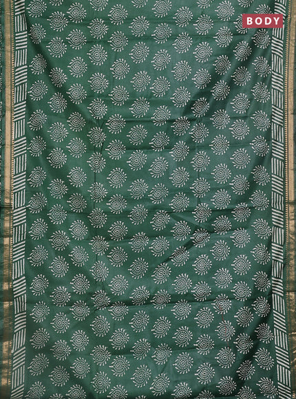 Semi bhagalpuri saree bottle green with allover prints and zari woven border