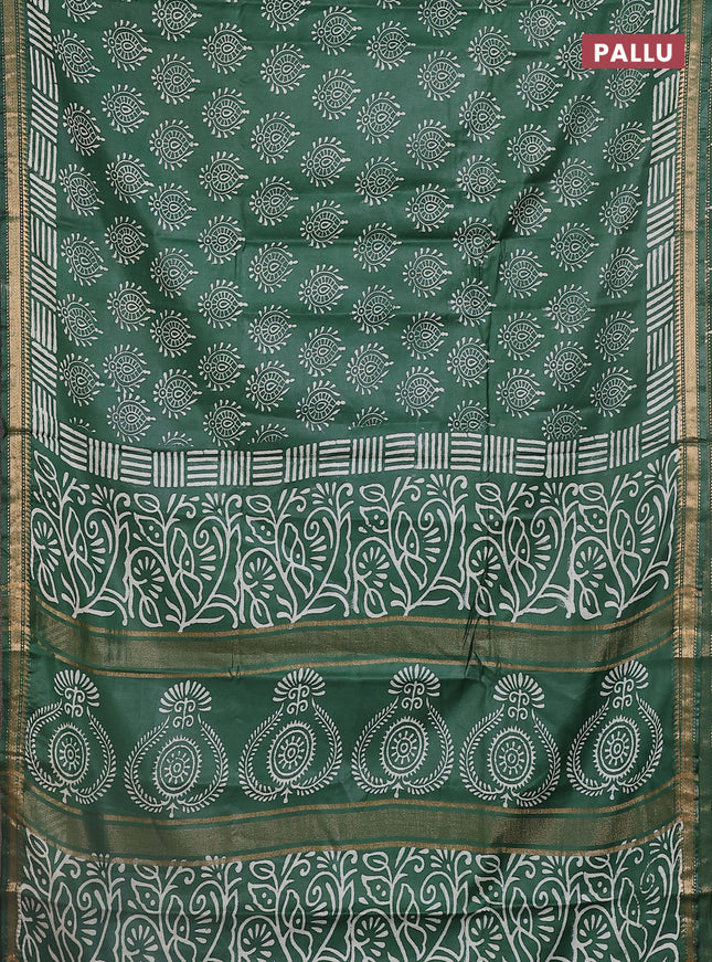 Semi bhagalpuri saree bottle green with allover prints and zari woven border
