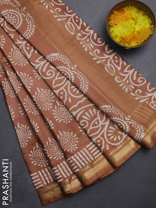 Semi bhagalpuri saree brown with allover prints and zari woven border