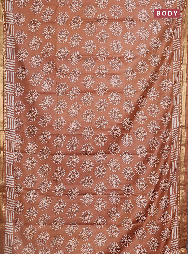 Semi bhagalpuri saree brown with allover prints and zari woven border