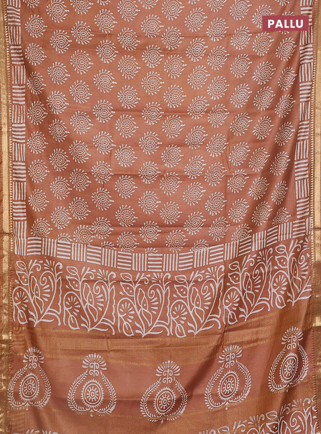 Semi bhagalpuri saree brown with allover prints and zari woven border