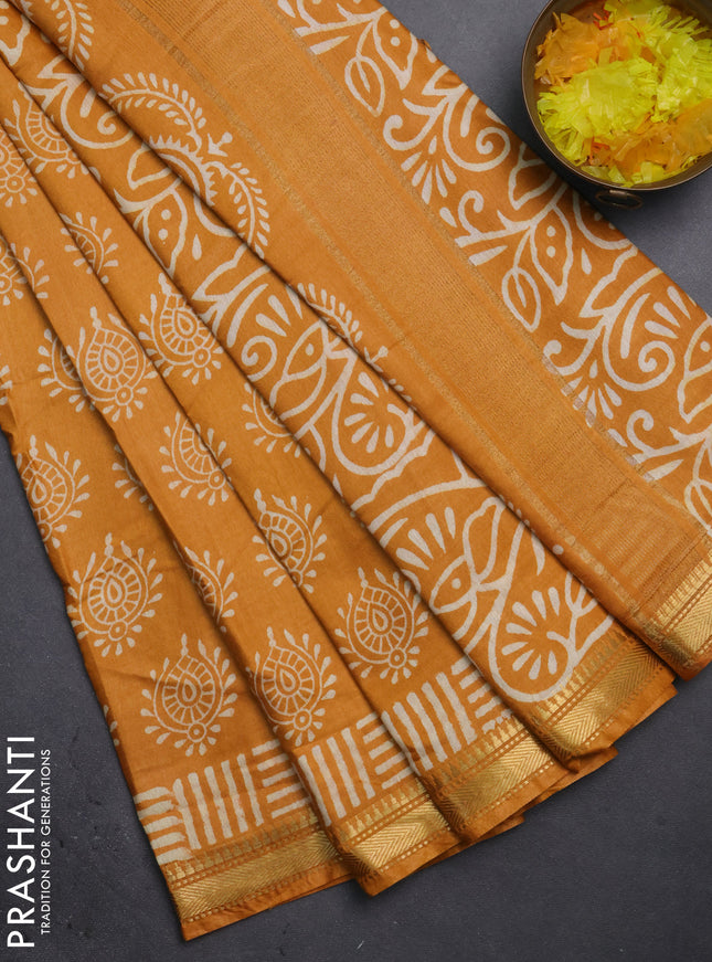 Semi bhagalpuri saree mustard yellow with allover prints and zari woven border