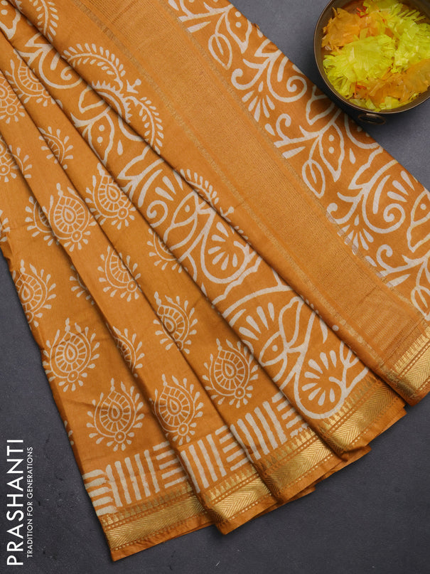 Semi bhagalpuri saree mustard yellow with allover prints and zari woven border