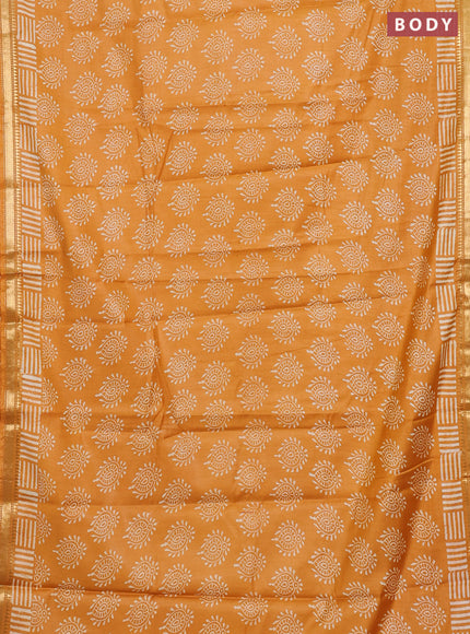 Semi bhagalpuri saree mustard yellow with allover prints and zari woven border