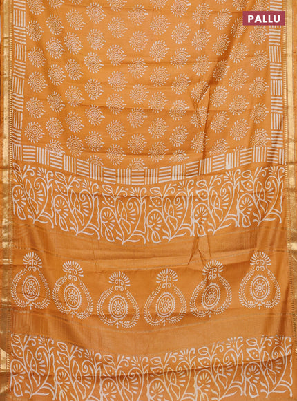 Semi bhagalpuri saree mustard yellow with allover prints and zari woven border