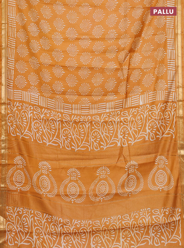 Semi bhagalpuri saree mustard yellow with allover prints and zari woven border
