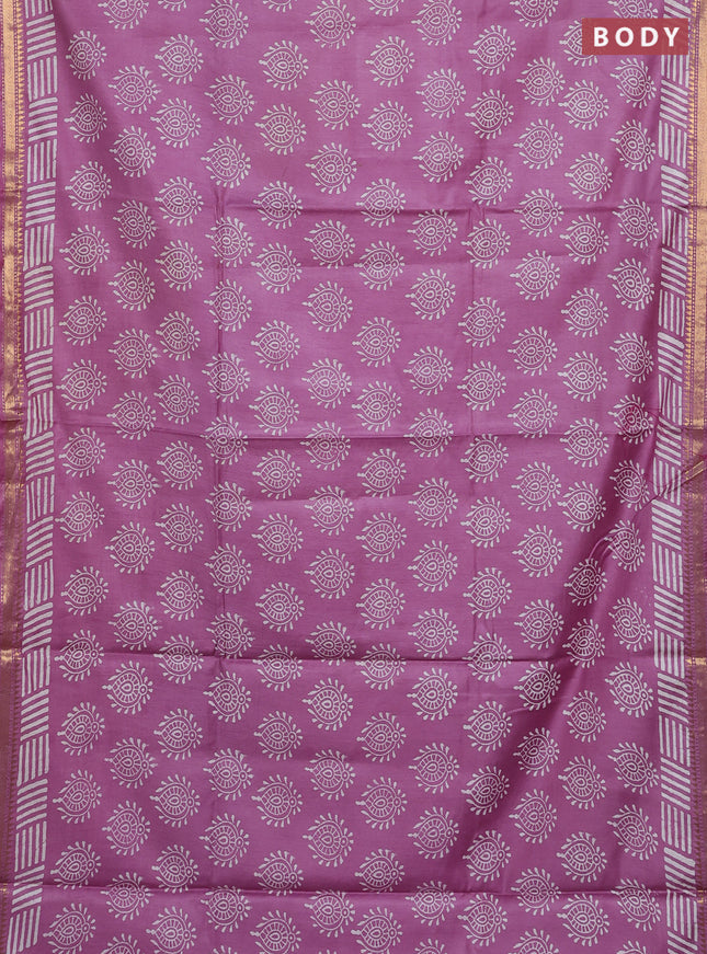 Semi bhagalpuri saree lavender with allover prints and zari woven border
