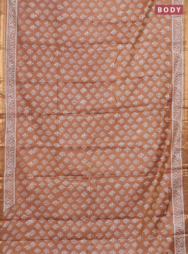 Semi bhagalpuri saree sandal with allover prints and zari woven border