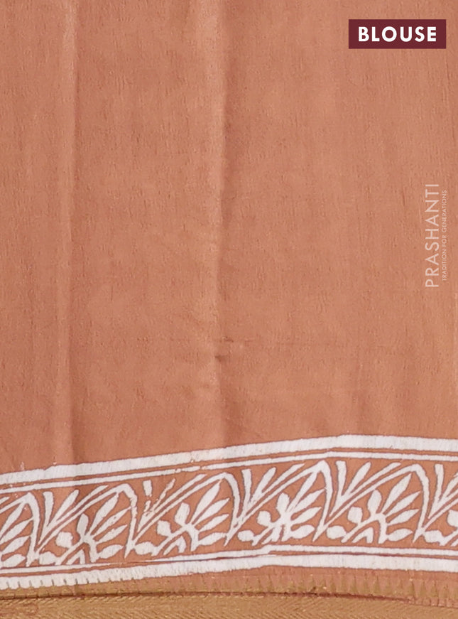 Semi bhagalpuri saree sandal with allover prints and zari woven border