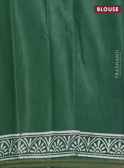 Semi bhagalpuri saree green with allover prints and zari woven border