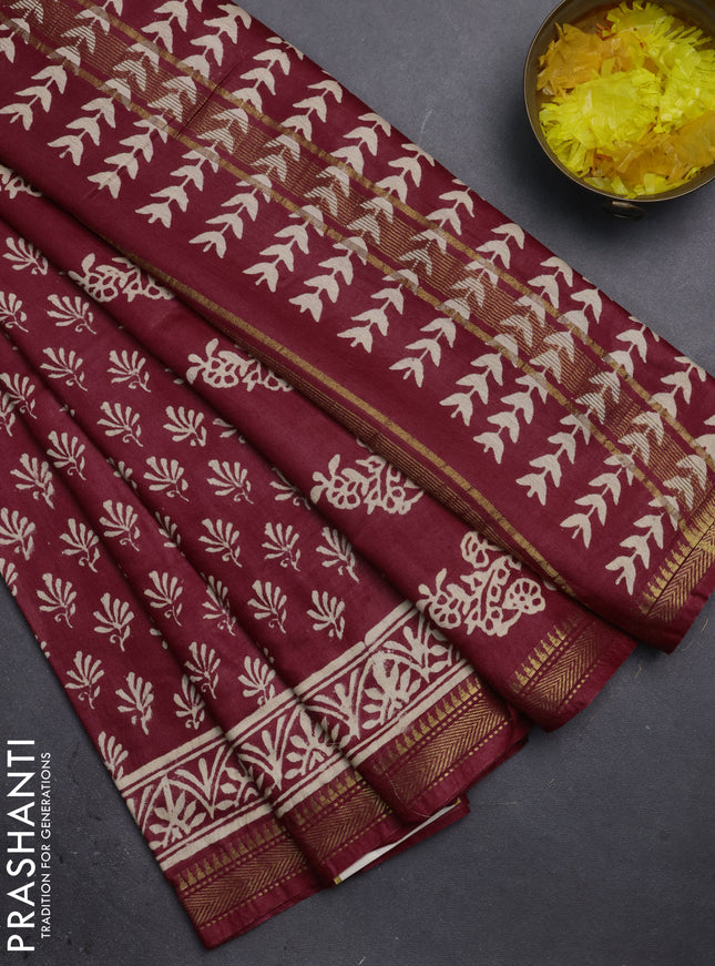Semi bhagalpuri saree maroon with allover prints and zari woven border