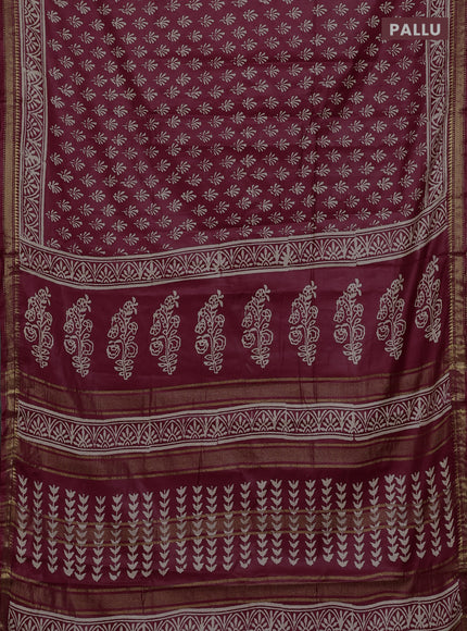 Semi bhagalpuri saree maroon with allover prints and zari woven border