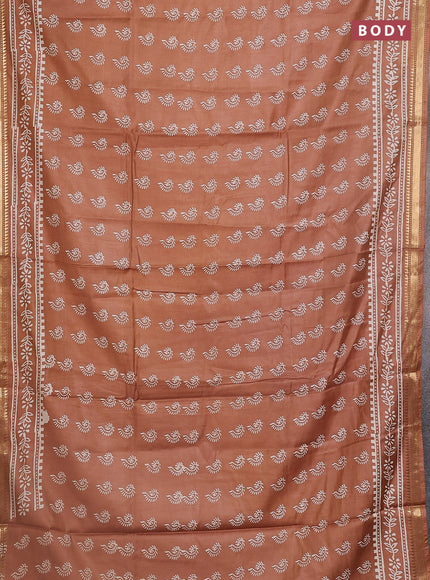 Semi bhagalpuri saree sandal with allover prints and zari woven border