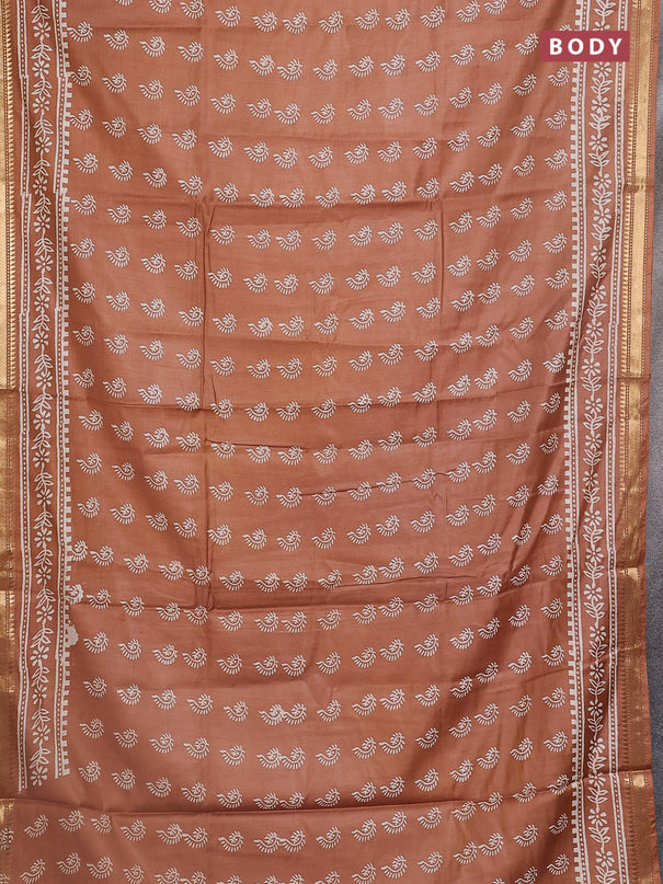 Semi bhagalpuri saree sandal with allover prints and zari woven border