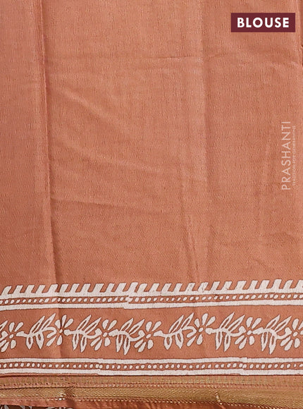 Semi bhagalpuri saree sandal with allover prints and zari woven border