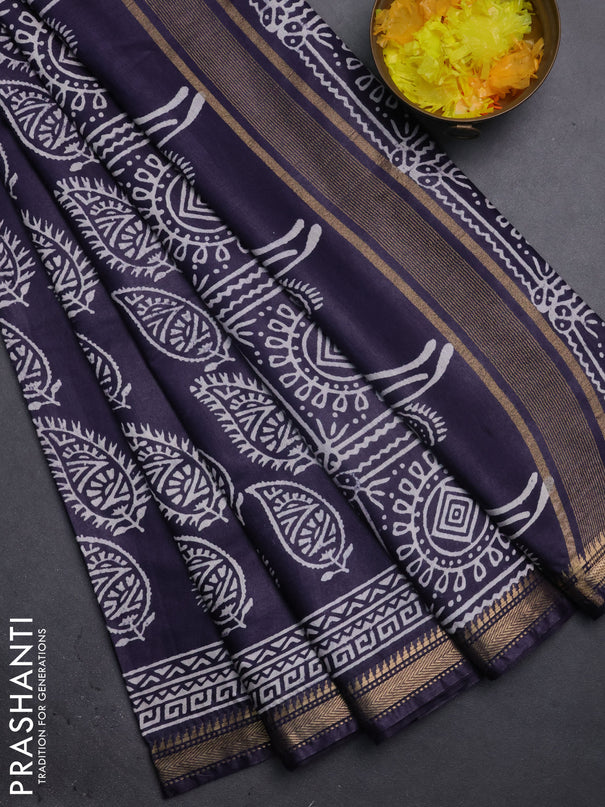 Semi bhagalpuri saree deep jamun with allover prints and zari woven border