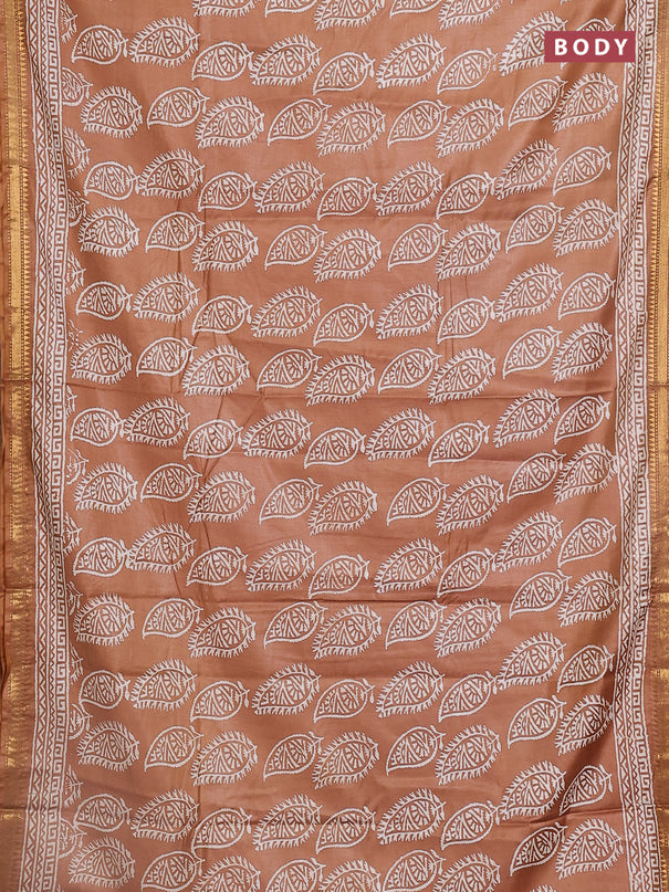 Semi bhagalpuri saree sandal with allover prints and zari woven border