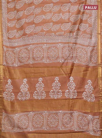 Semi bhagalpuri saree sandal with allover prints and zari woven border