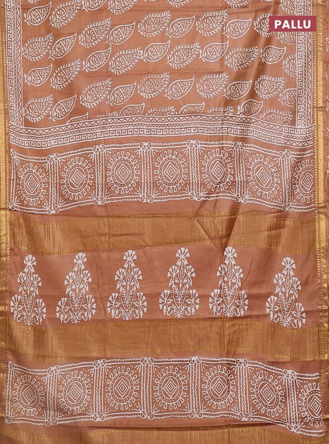 Semi bhagalpuri saree sandal with allover prints and zari woven border