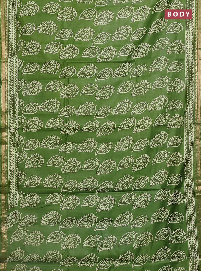 Semi bhagalpuri saree light green with allover prints and zari woven border