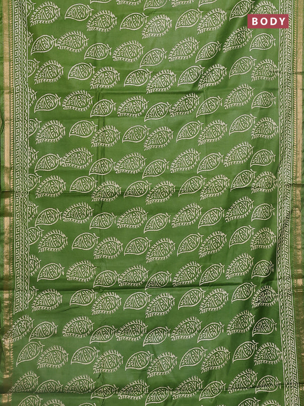 Semi bhagalpuri saree light green with allover prints and zari woven border