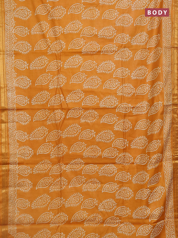 Semi bhagalpuri saree mustard yellow with allover prints and zari woven border