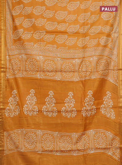 Semi bhagalpuri saree mustard yellow with allover prints and zari woven border