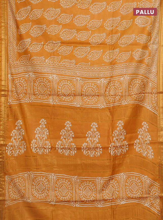 Semi bhagalpuri saree mustard yellow with allover prints and zari woven border