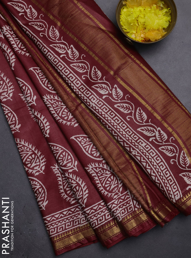Semi bhagalpuri saree maroon with allover prints and zari woven border