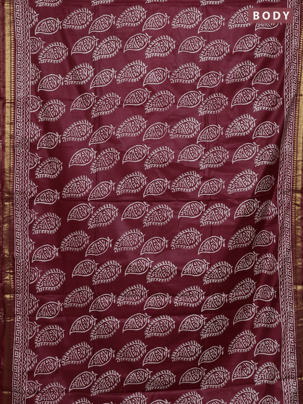 Semi bhagalpuri saree maroon with allover prints and zari woven border