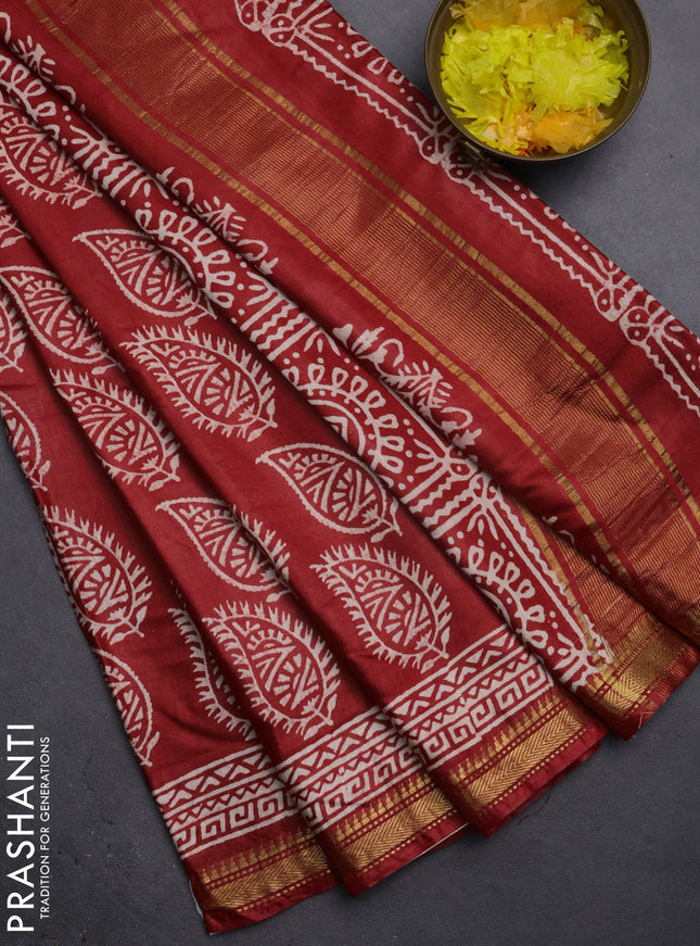 Semi bhagalpuri saree red with allover prints and zari woven border