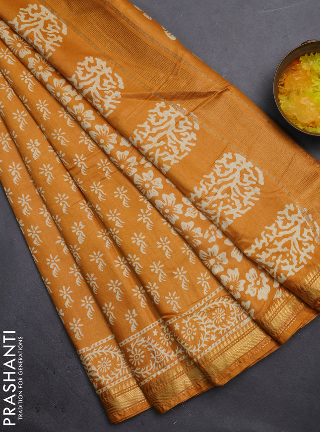 Semi bhagalpuri saree mustard yellow with allover prints and zari woven border