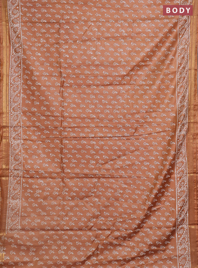 Semi bhagalpuri saree sandal with allover prints and zari woven border
