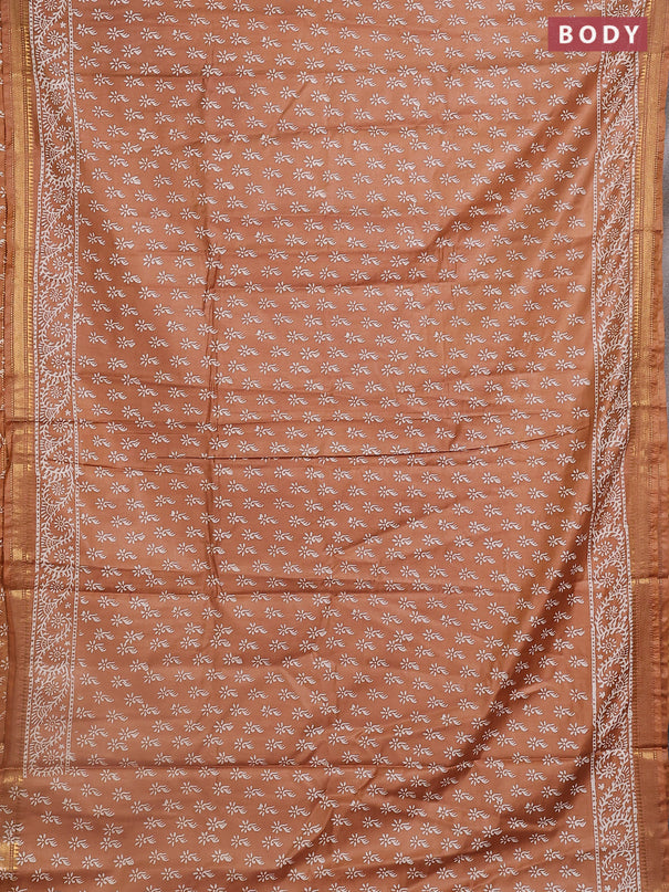 Semi bhagalpuri saree sandal with allover prints and zari woven border