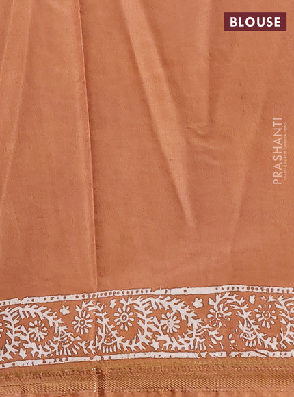 Semi bhagalpuri saree sandal with allover prints and zari woven border