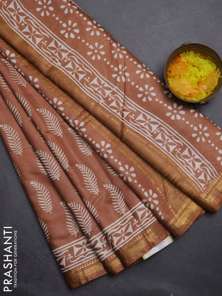 Semi bhagalpuri saree sandal with allover prints and zari woven border
