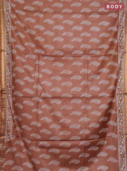 Semi bhagalpuri saree sandal with allover prints and zari woven border