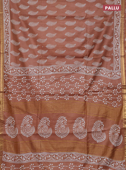 Semi bhagalpuri saree sandal with allover prints and zari woven border
