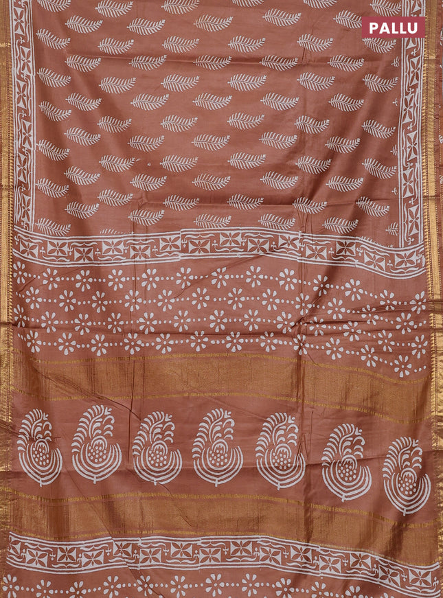 Semi bhagalpuri saree sandal with allover prints and zari woven border