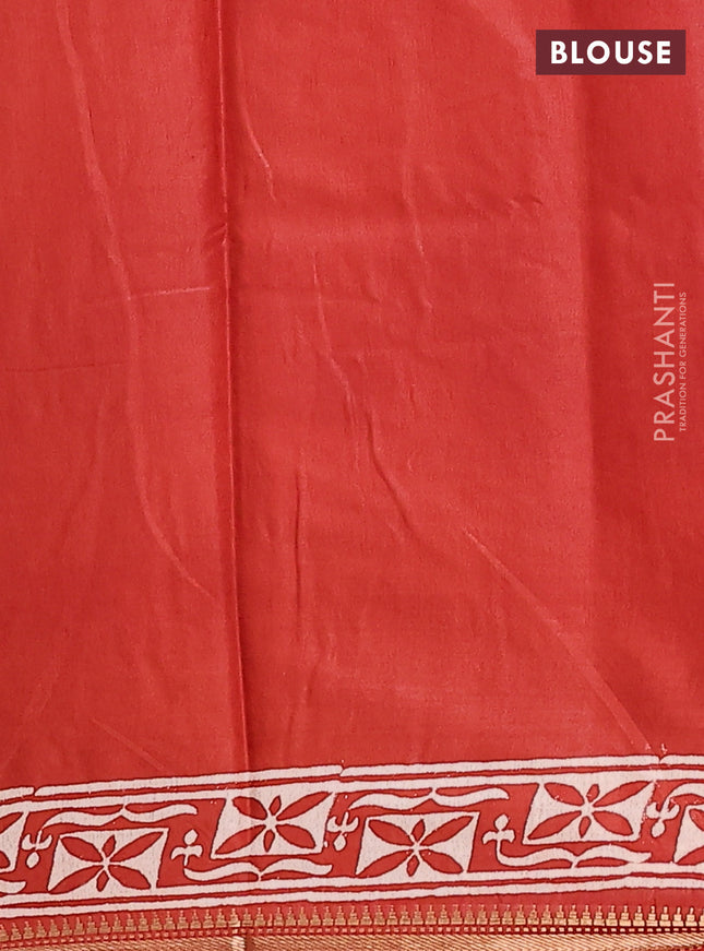 Semi bhagalpuri saree rust with allover prints and zari woven border