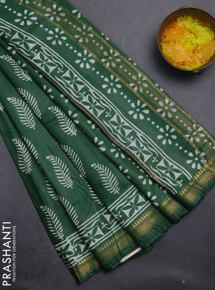 Semi bhagalpuri saree green with allover prints and zari woven border
