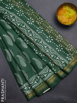 Semi bhagalpuri saree green with allover prints and zari woven border
