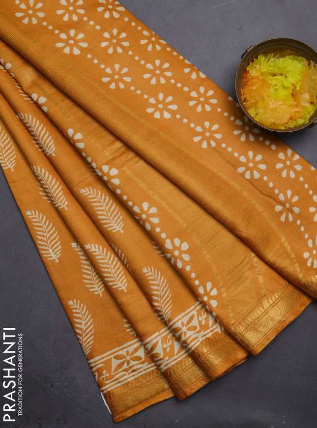 Semi bhagalpuri saree mustard yellow with allover prints and zari woven border