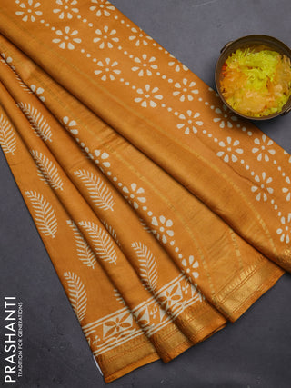Semi bhagalpuri saree mustard yellow with allover prints and zari woven border